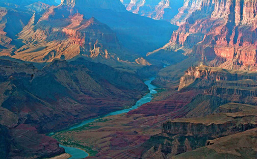 The S curved Colorado River leads your eyes through the depths of the Grand Canyon.